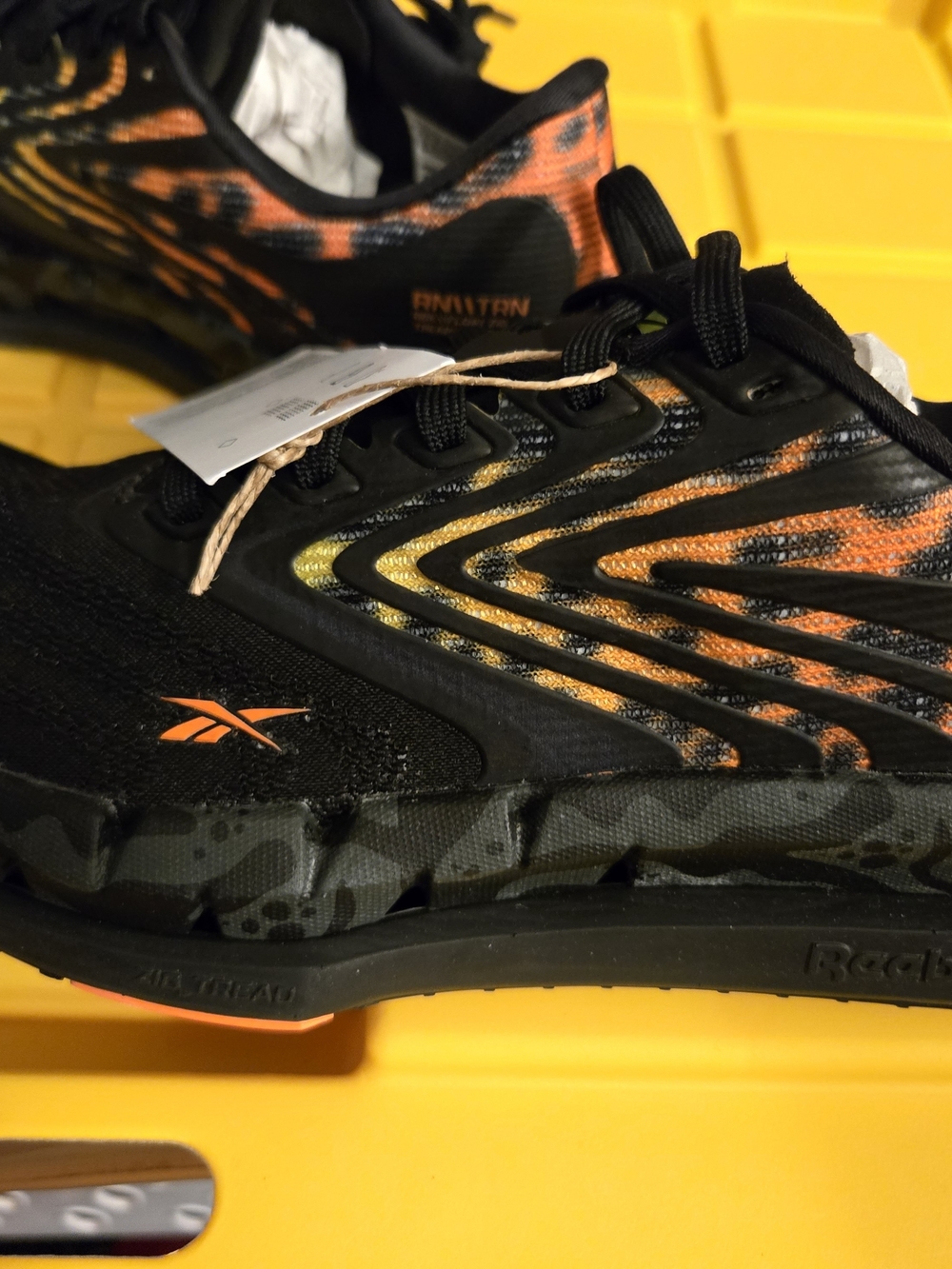 Reebok Black, Orange & Yellow Athletic Sneakers